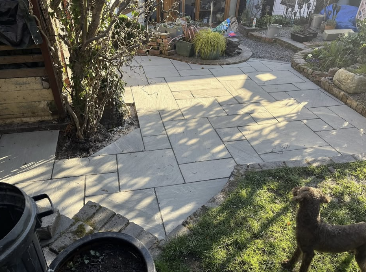 Sun-drenched Sandstone Patio & Lawn