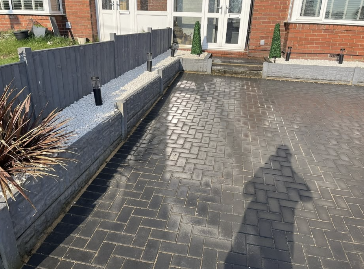 Charcoal Driveway & Retaining Wall