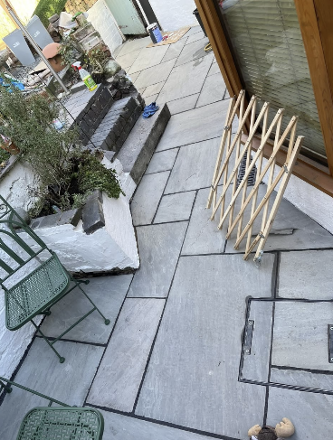 Grey Riven Patio with Raised Bed